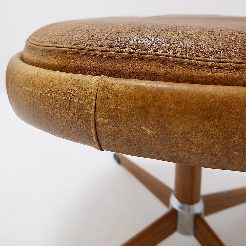 Brown leather swivel footrest with metal base - De Sede, Switzerland.