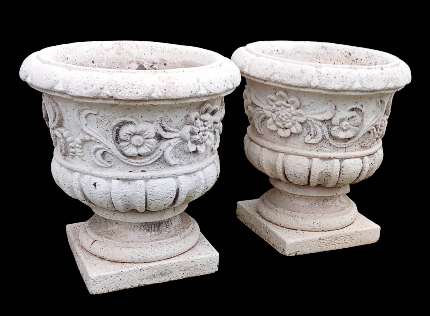 Pair of Medici planters with floral decoration