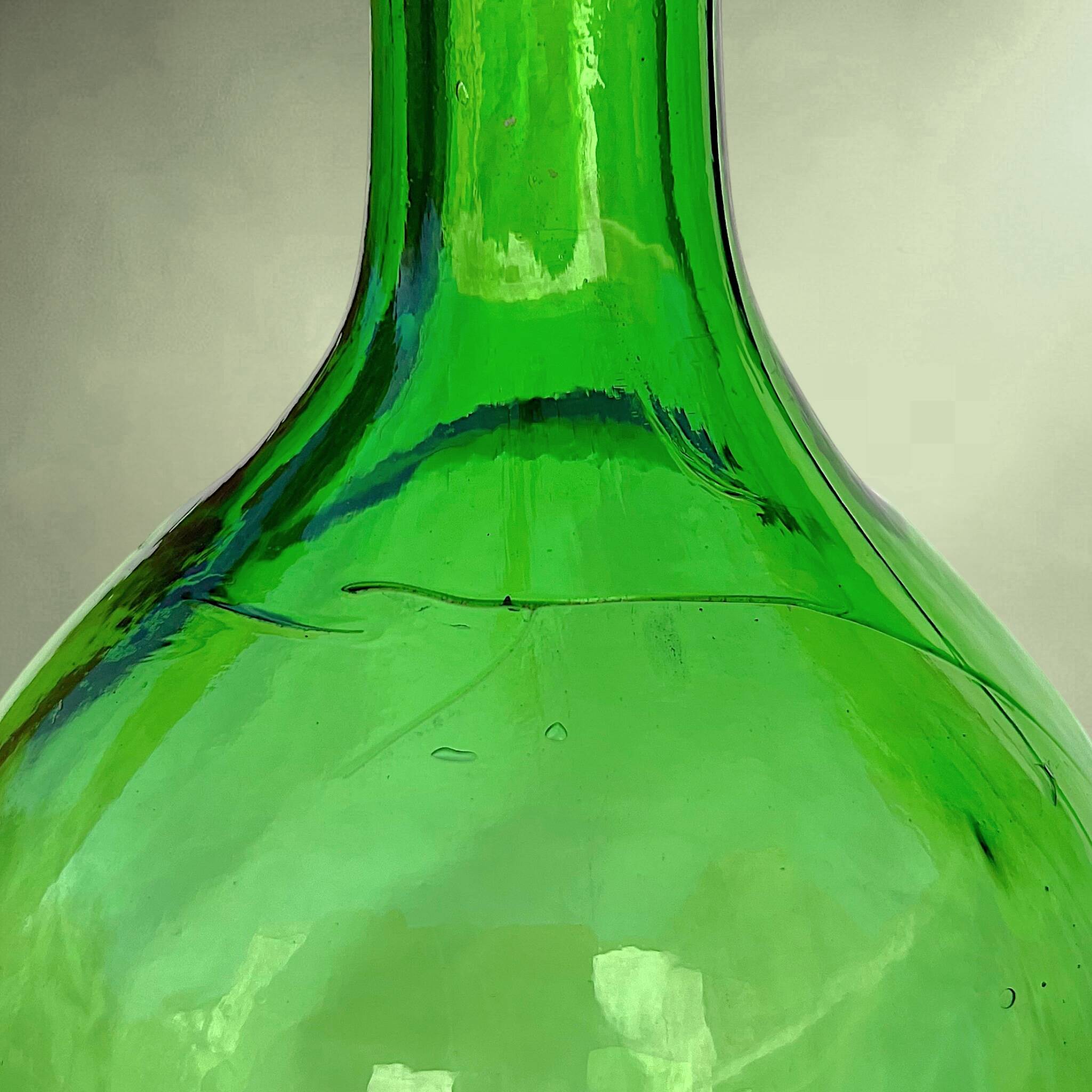 Large antique green glass bottle – early 20th century