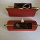 Pair of modernist swivel wall lights in red sheet metal, 1950s