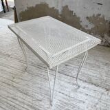 Perforated garden dining table
