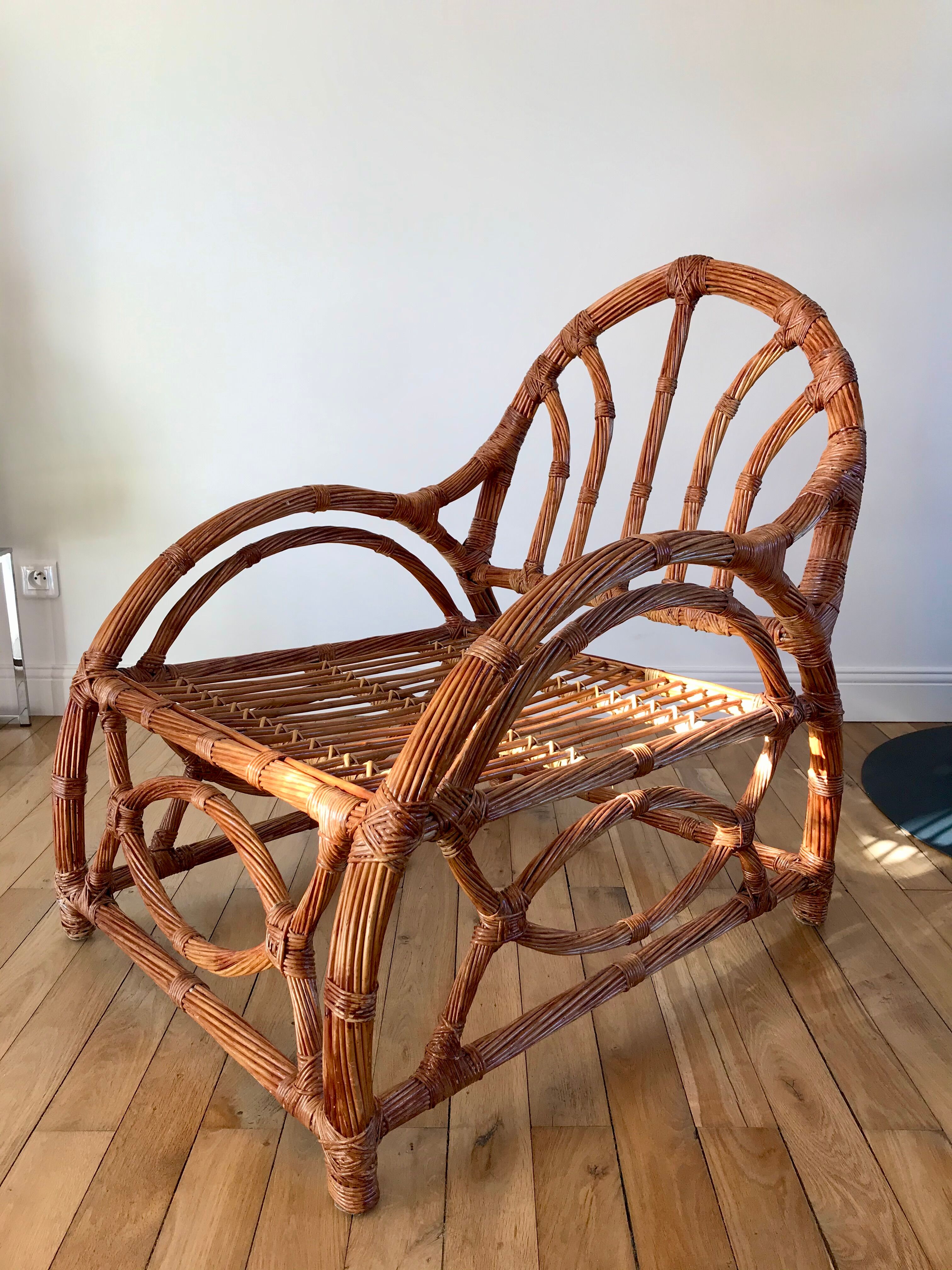 Pair of rattan armchairs 50s