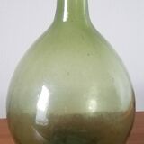 Vintage green demijohn