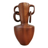 wooden vase carved in the mass