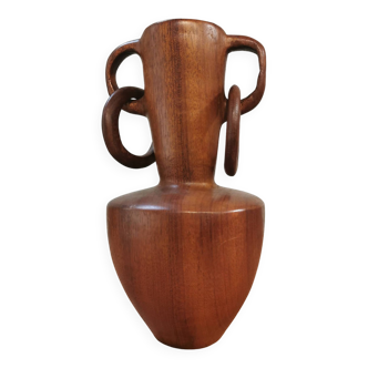 wooden vase carved in the mass