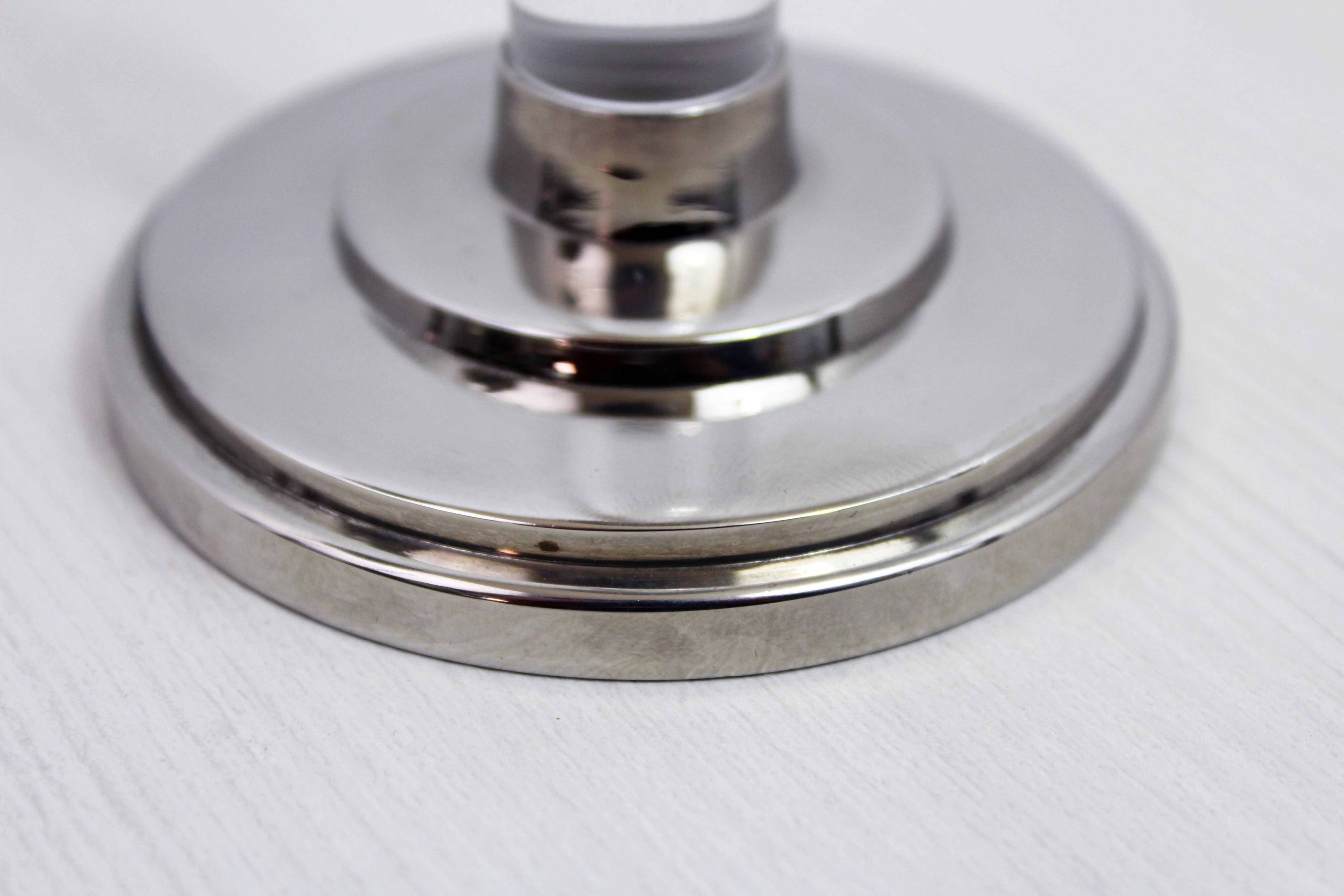 Pair of lucite and silver-plated metal candlesticks