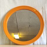 Round orange plastic mirror - 1970s