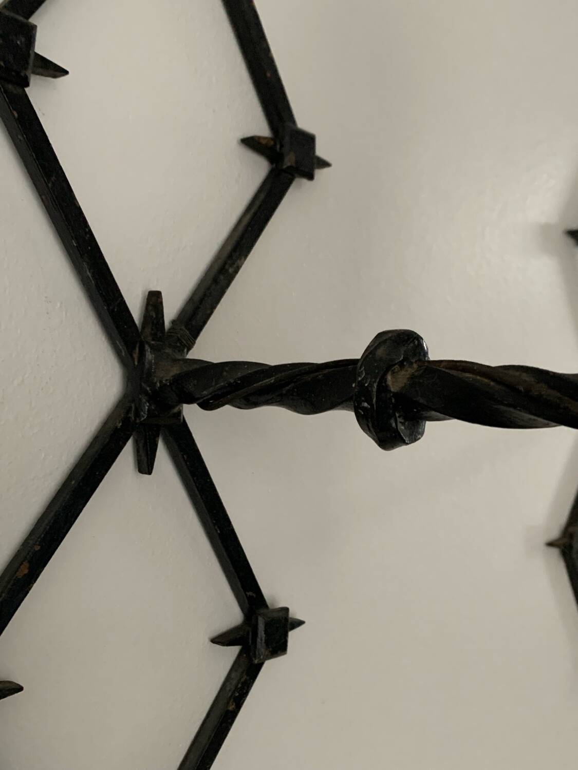 Wrought iron wall lights from the 60s