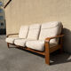 Three-seater sofa in Danish teak from the 1960s.