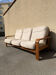 Three-seater sofa in Danish teak from the 1960s.