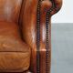 Fauteuil club en cuir de mouton
