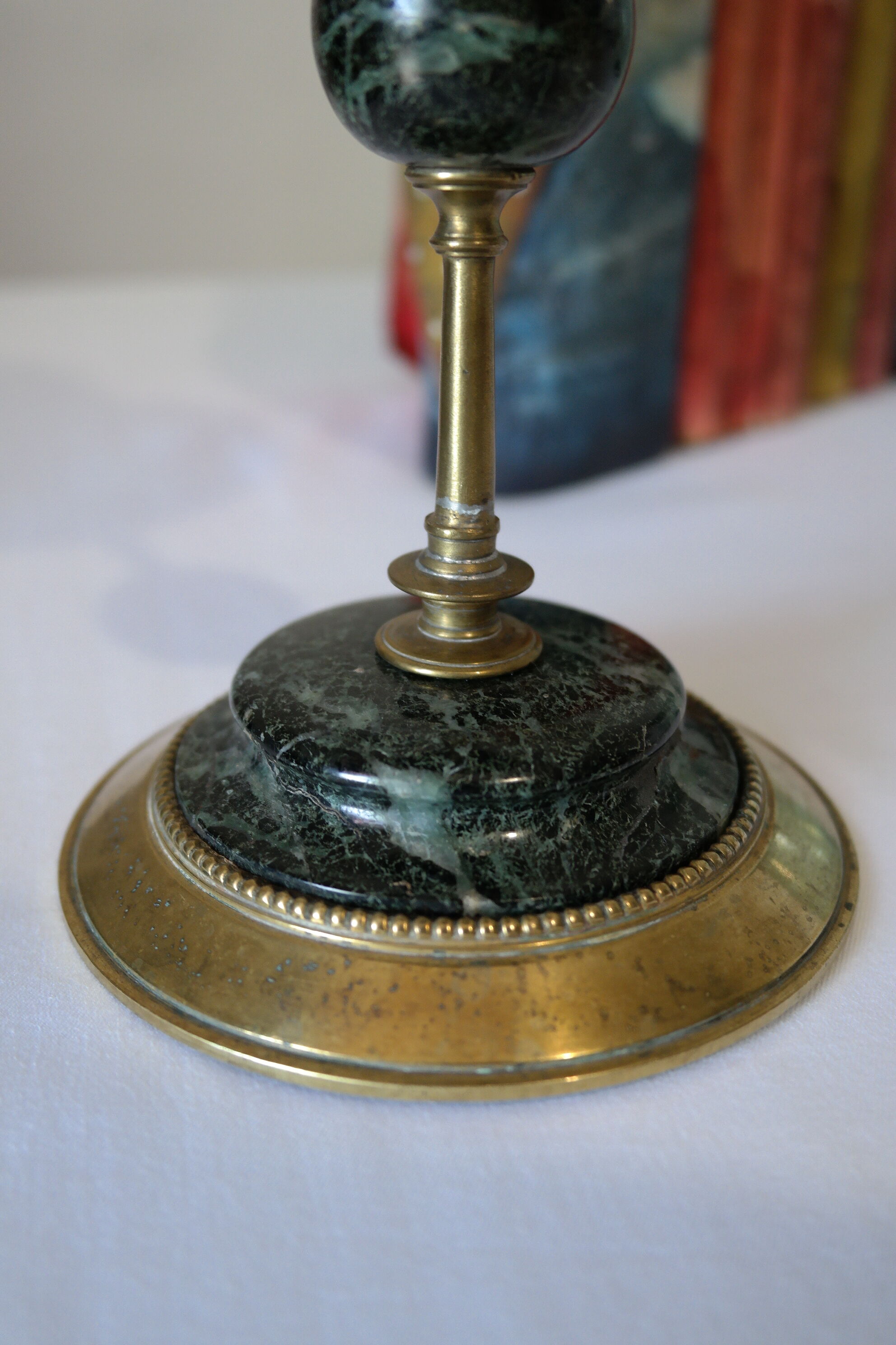Brass and green marble candlestick