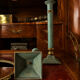 Exceptional pair of large candlesticks in patinated greenish-blue brass.