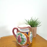 Porseleinen vintage roze kan met bloemen