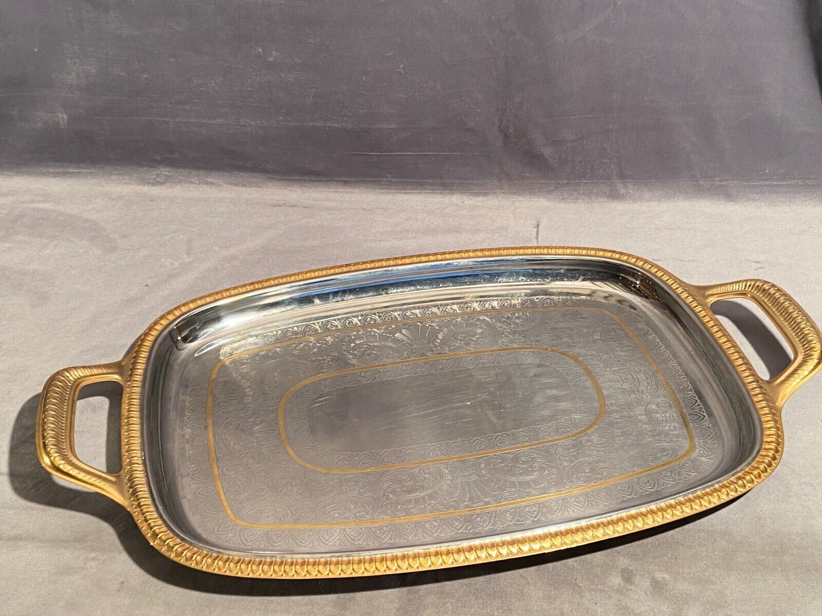 Top with stainless steel handles and gilded Regency style nets