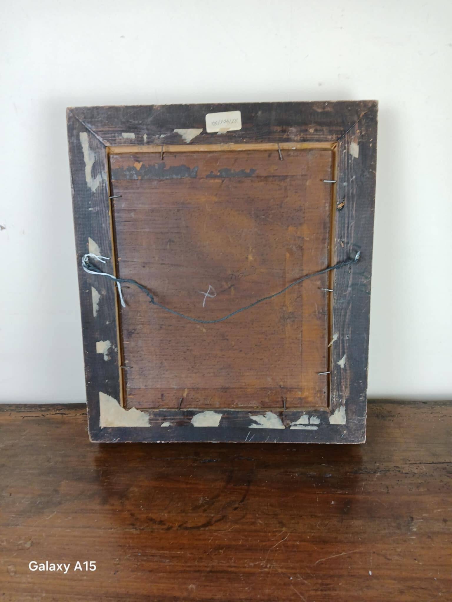 Oil on panel depicting a lively bourgeois scene