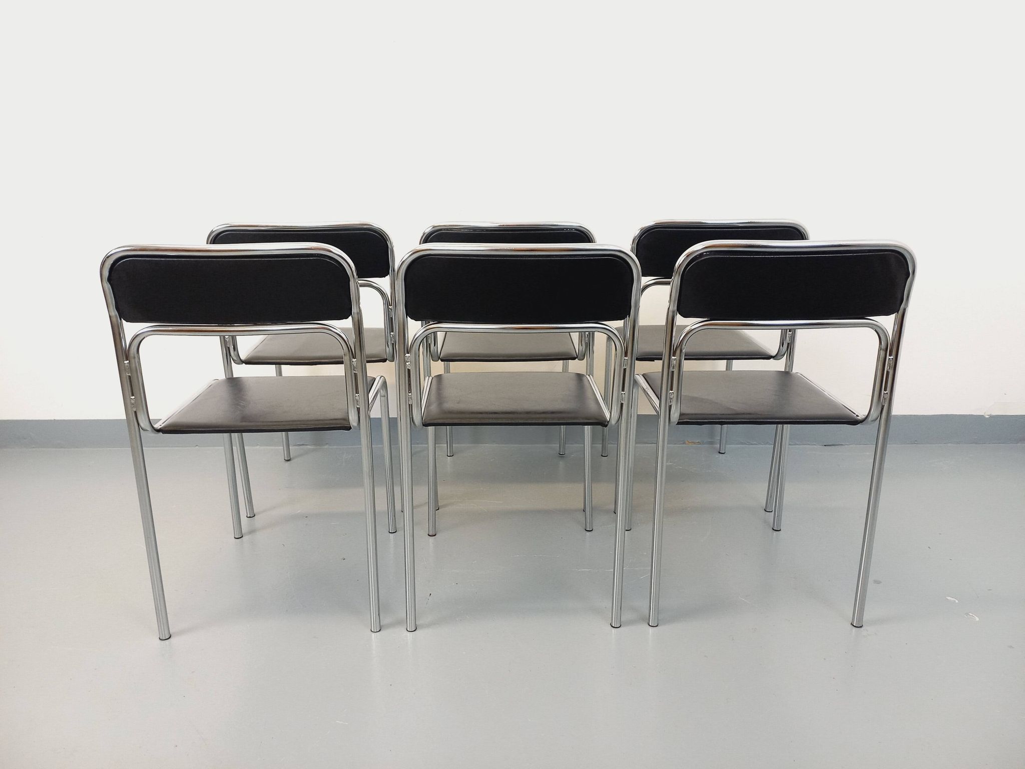 Set of 6 vintage Italian stackable chairs in chrome metal and skai.