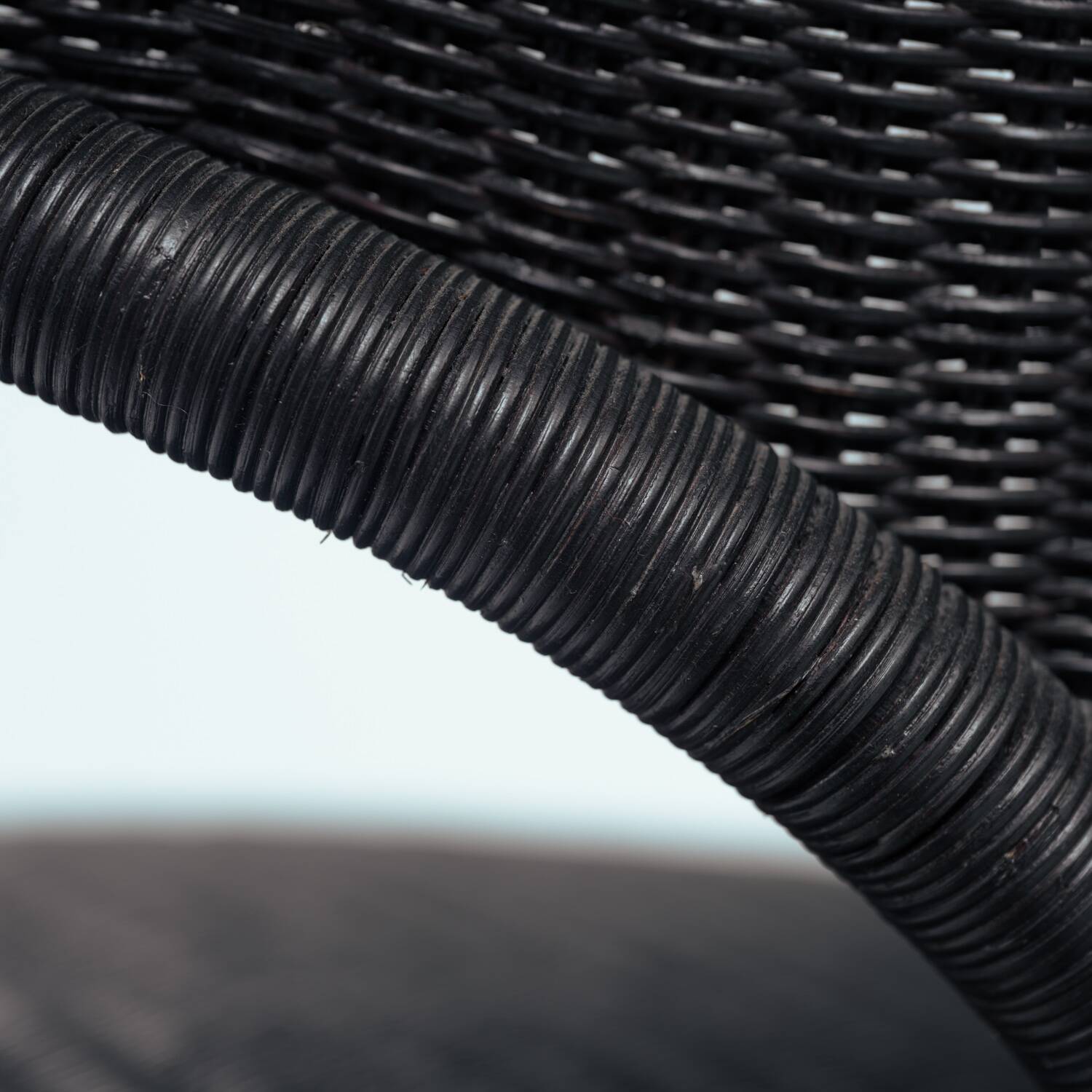 Sculptural rattan tripod armchairs in the manner of Boris Sipek