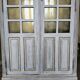 Antique library finished in white with a cerused effect.