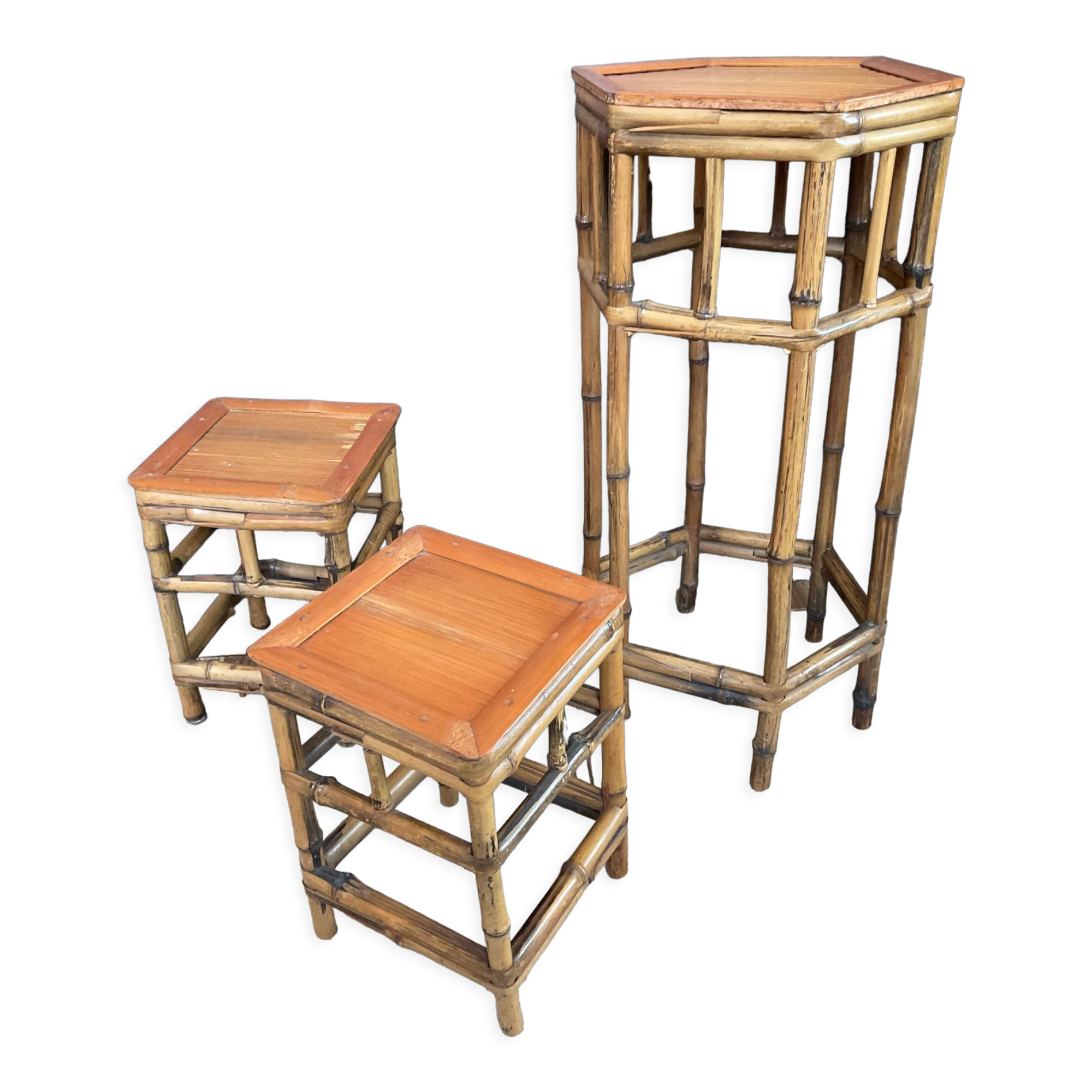 Trio of vintage rattan plant holders in the 60s
