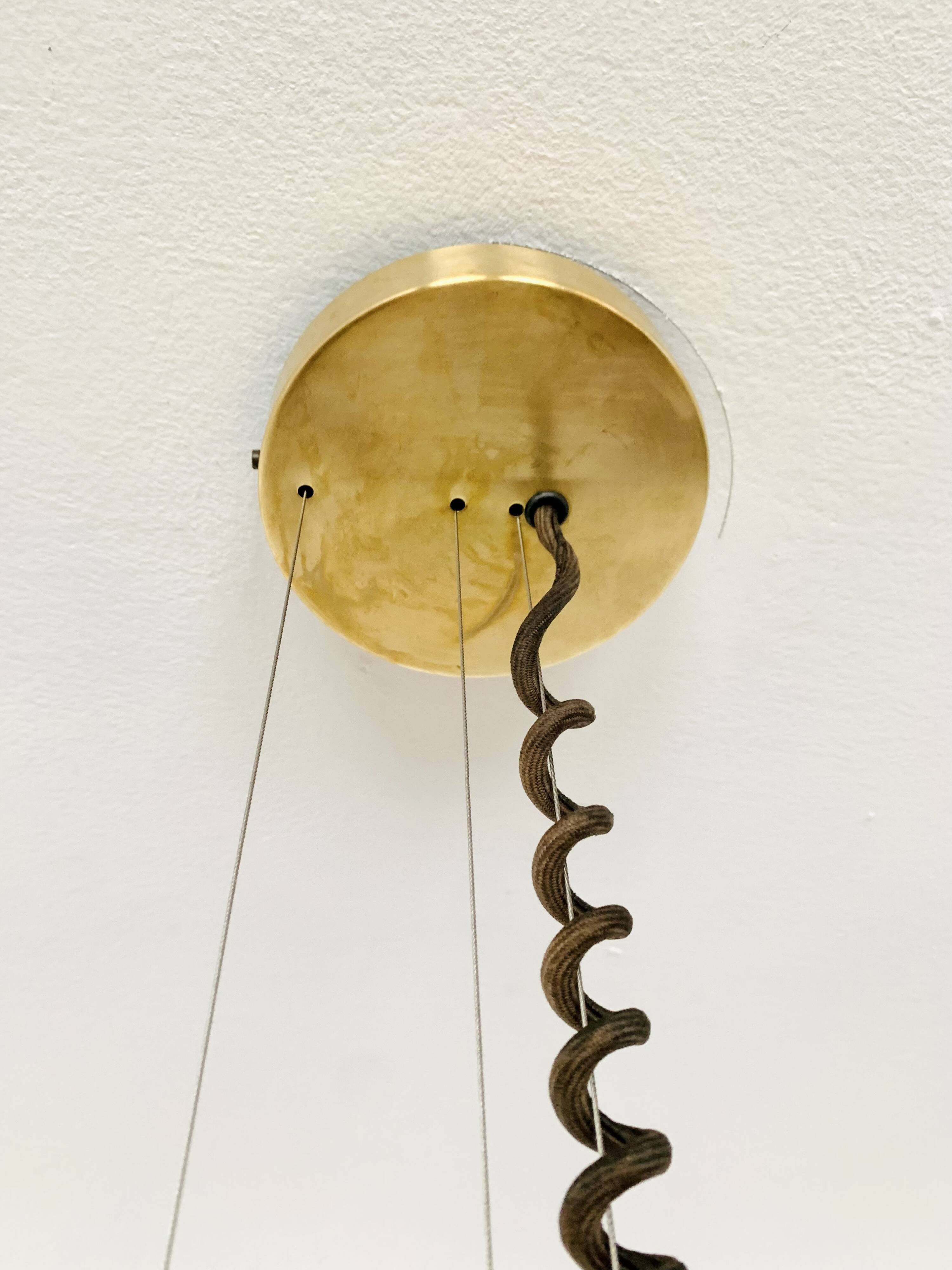 1 of 3 Awesome Adjustable Orion Glass Pendant Lamps from Staff