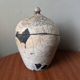 Handmade raku ceramic pot in contemporary Japandi design.