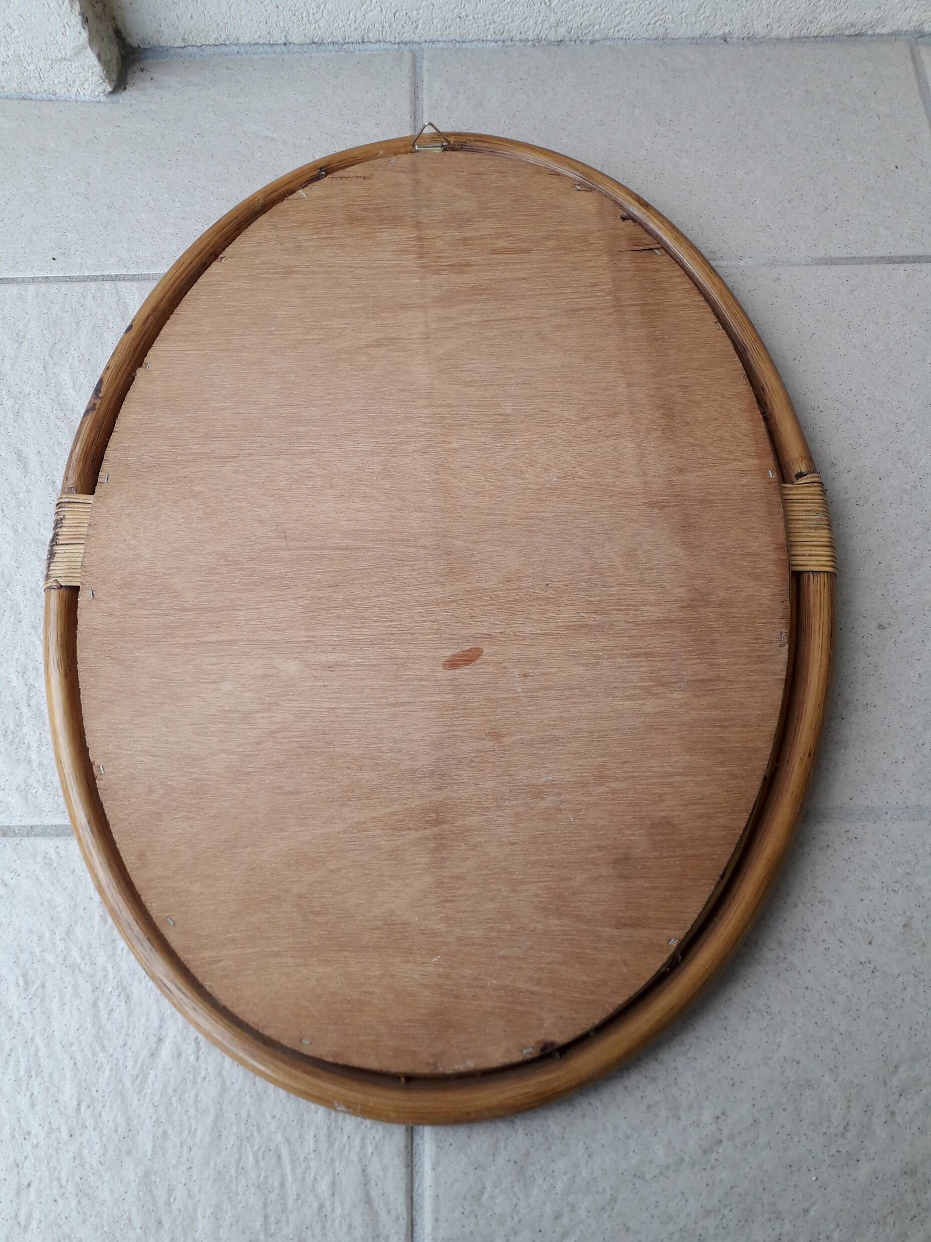 Oval rattan mirror