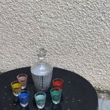 Liquor service consisting of a carafe and 6 small shot glasses, houndstooth pattern