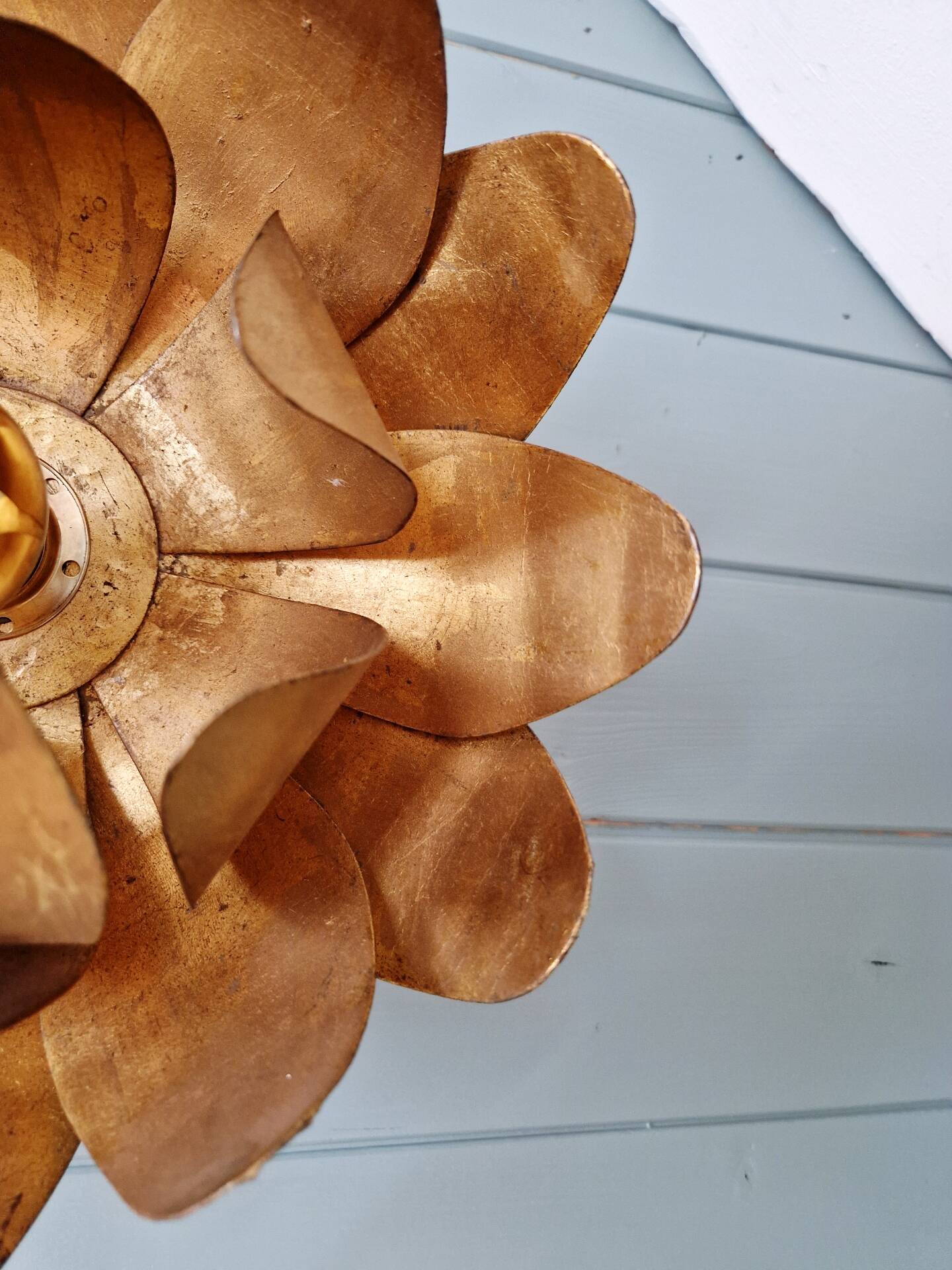 Gold metal floral wall light, 1960-70.