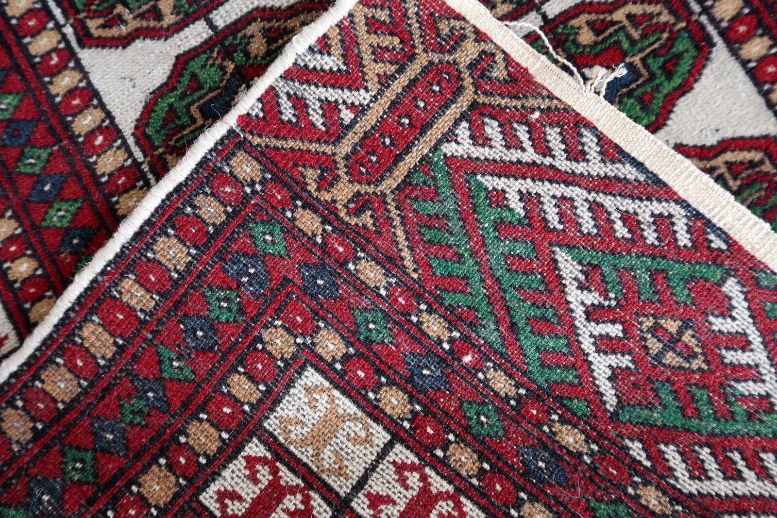 Handmade vintage Uzbek Bukhara rug 77cm x 128cm 1960s - 1С1175