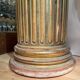 Large fluted golden wood column with a marble top, work from around 1900.