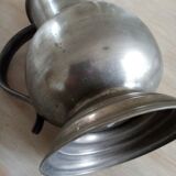 Old tin pitcher