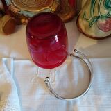 Vintage crystal ice bucket with silver-plated handle.