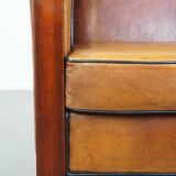 Sheep leather and wooden Art Deco design armchair with ball feet