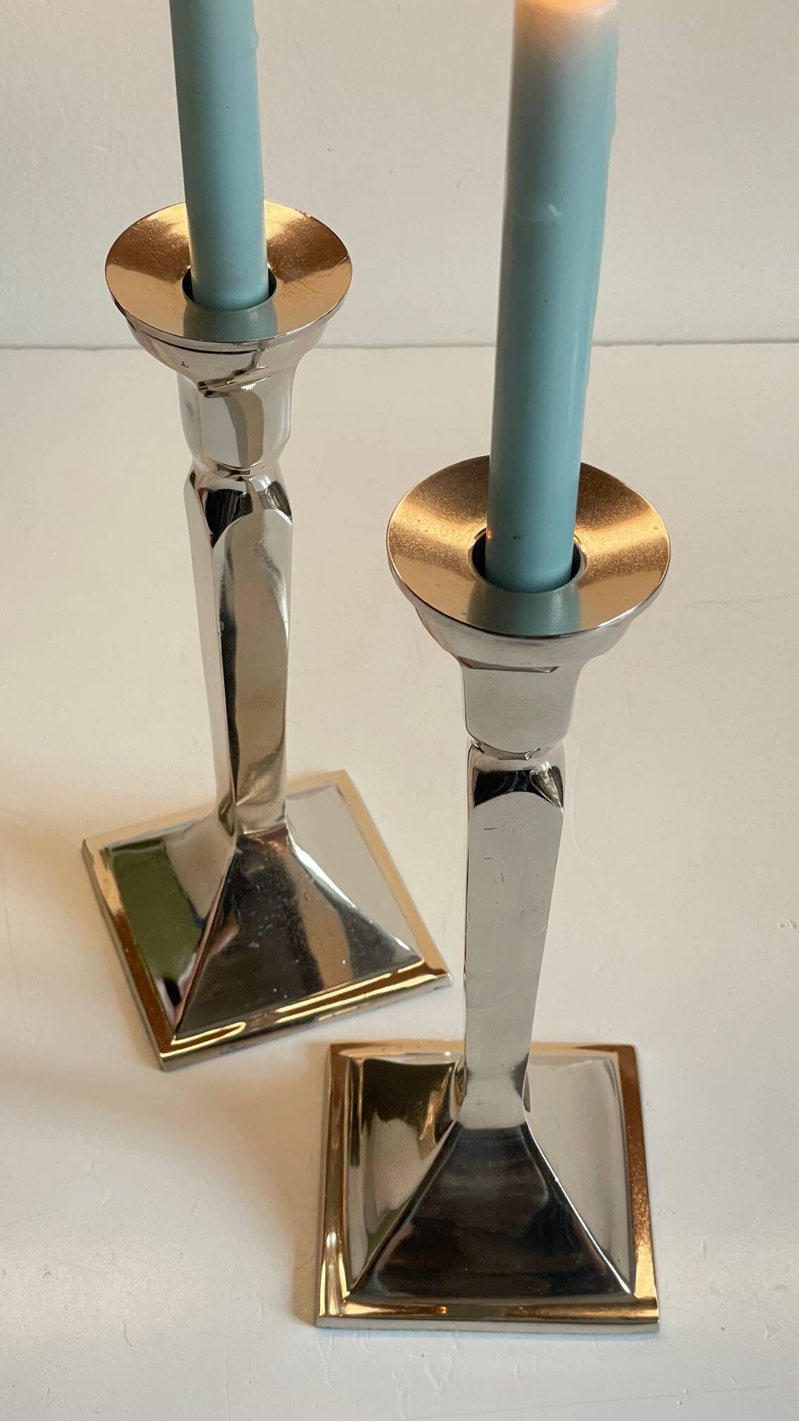 Pair of vintage cast aluminum candlesticks