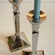 Pair of vintage cast aluminum candlesticks
