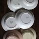 6 mismatched deep plates in floral colours from Digoin, Sarreguemines, Gien.