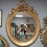 Miroir ovale en bois doré 93x73cm