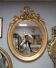 Oval mirror in gilded wood 93x73cm