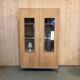 Glass-fronted school cabinet in raw oak