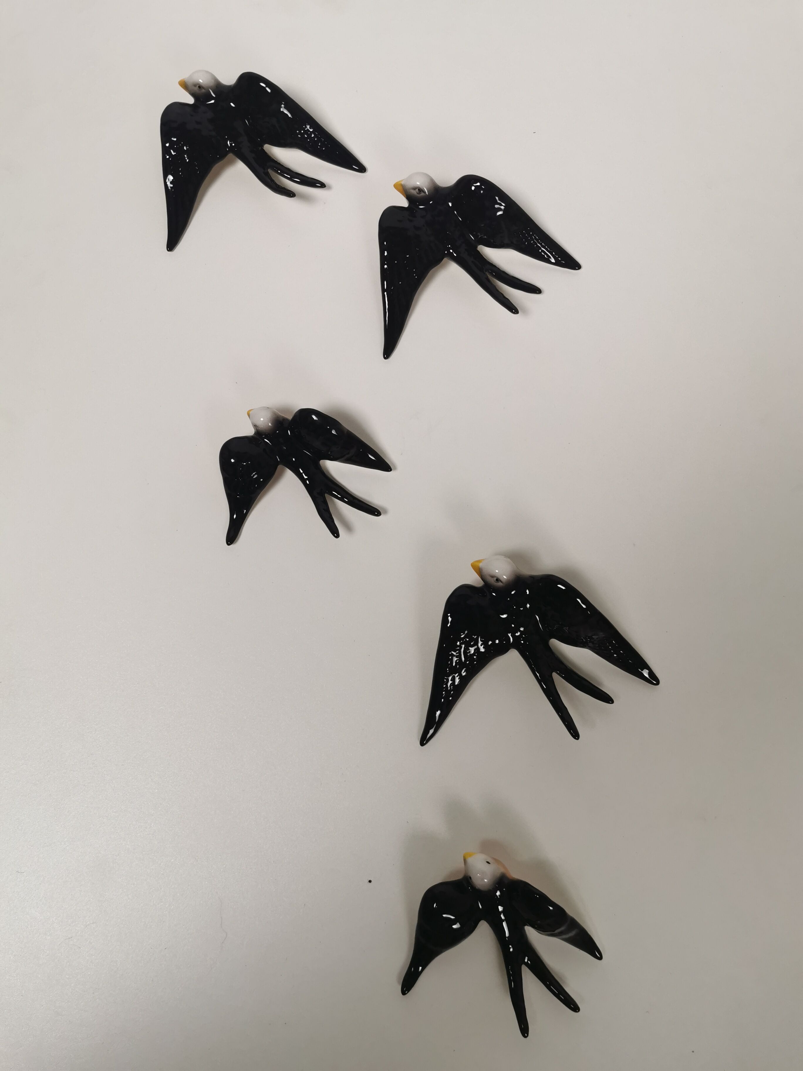 Batch of ceramic swallows