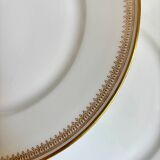 6 flat plates in gold porcelain monogrammed "F"