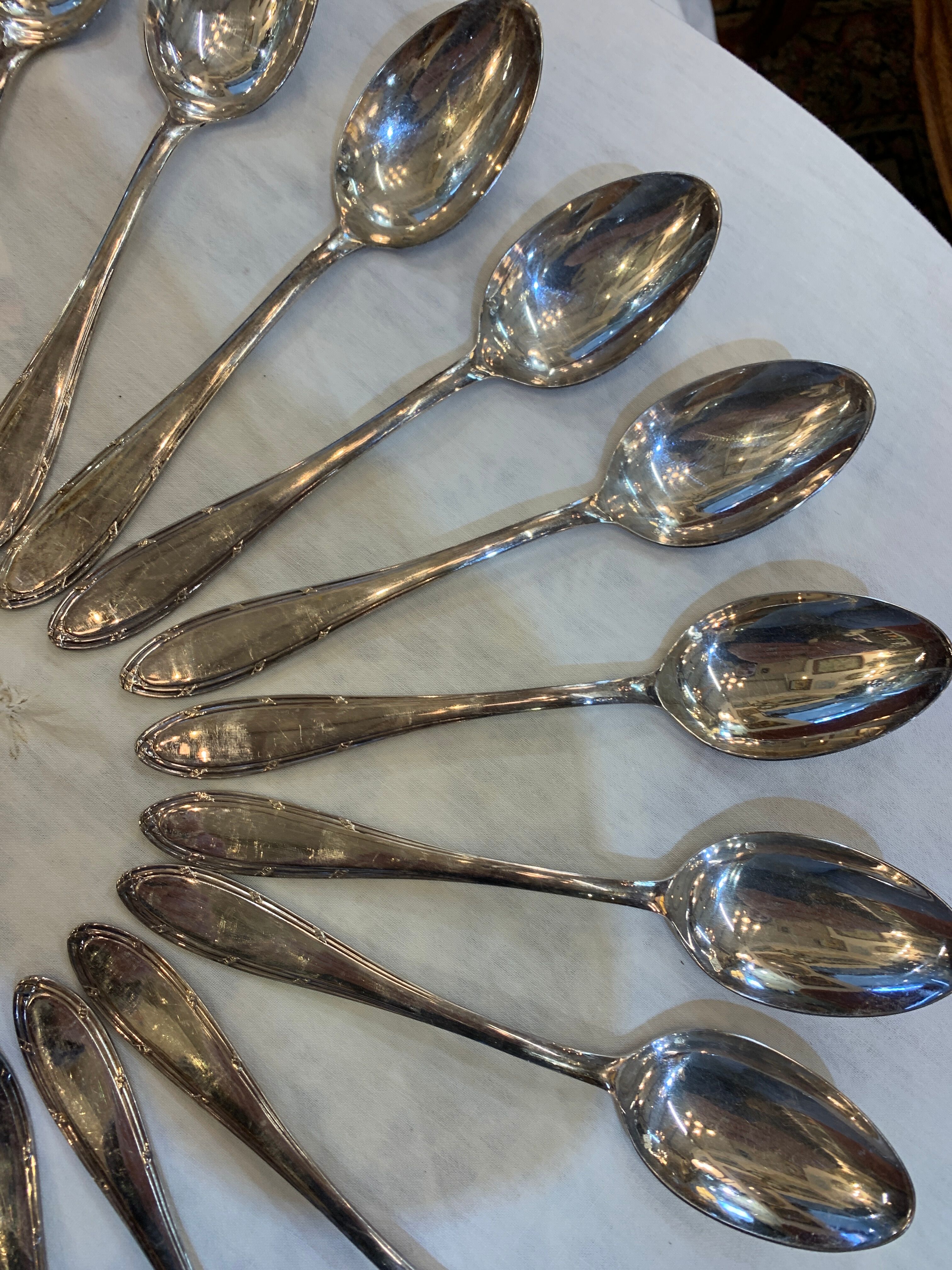 Series of 12 forks and 12 silver metal spoons