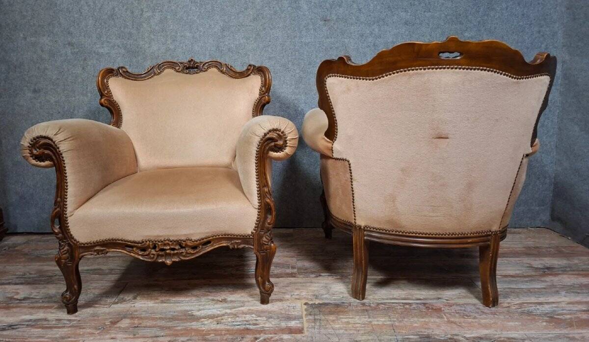 Pair of sculpted walnut armchairs – Louis XV style – 20th century