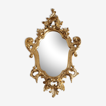 Wooden and gilded mirror with gold leaf