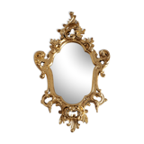 Wooden and gilded mirror with gold leaf