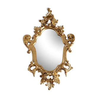 Wooden and gilded mirror with gold leaf