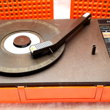 Old thomson stereo record player batteries and vintage sector orange