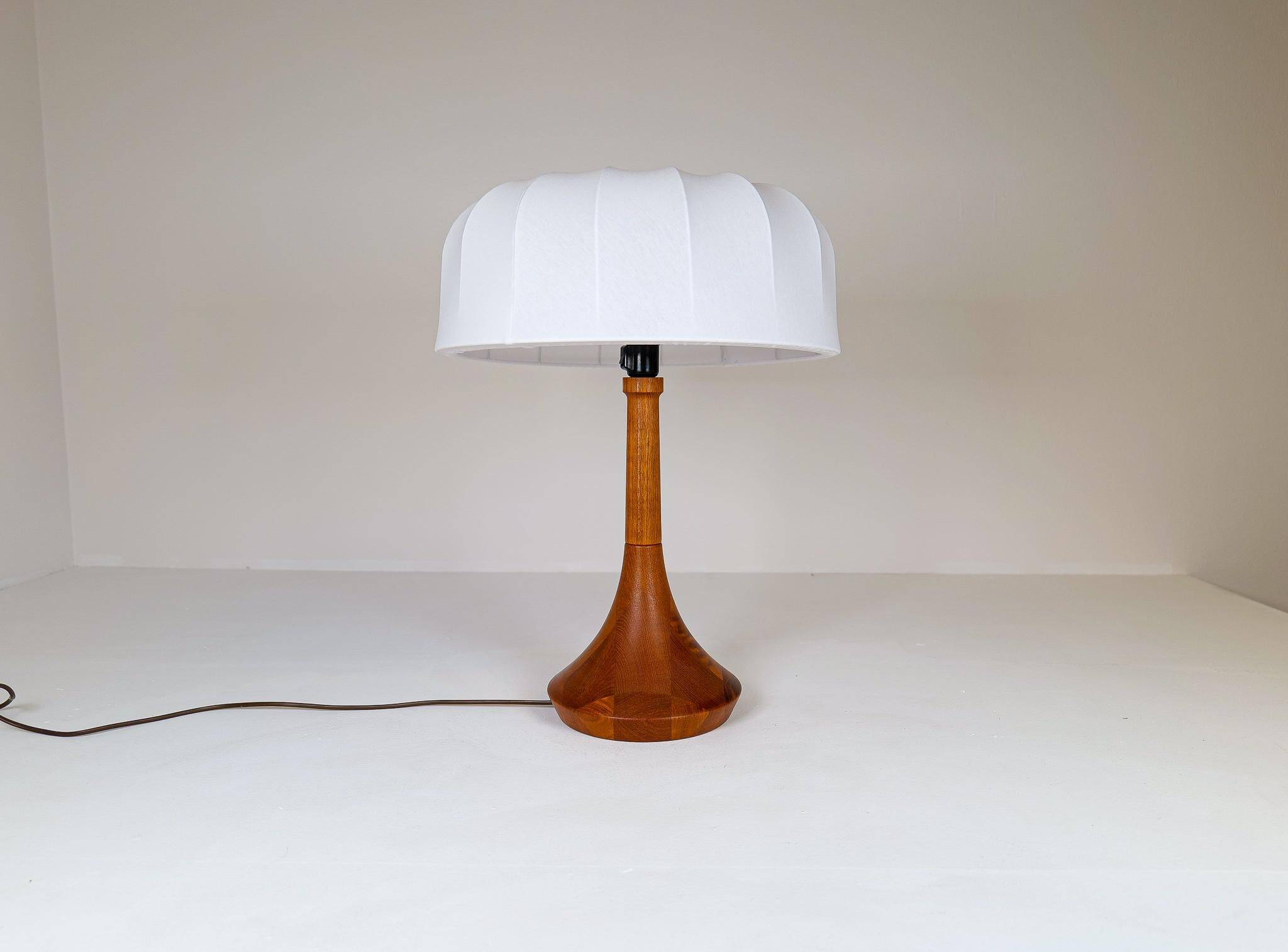 Mid-century table lamp in solid teak by Lisbeth Brams, Denmark, 1960s.