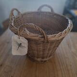 Old wicker basket with 3 handles.